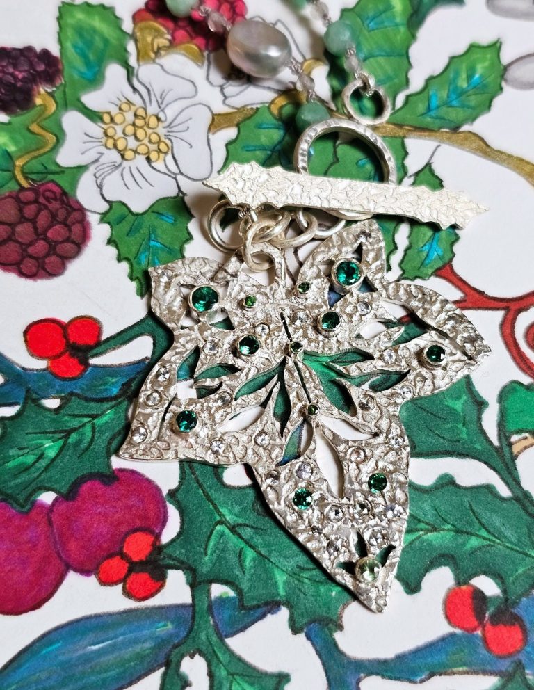 Silver ivy pendant with green gemstones Silver ivy pendant necklace, green and white gemstones, holly leaf silver toggle, gemstone beads, isobel-kelly-jewellery.co.uk/